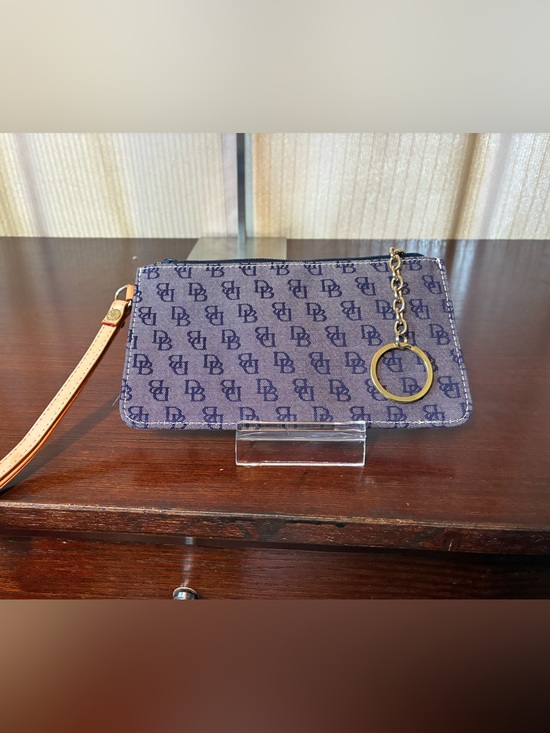 Dooney & Bourke Handbags - Dooney & Bourke Navy Monogram Wristlet with Tan Strap